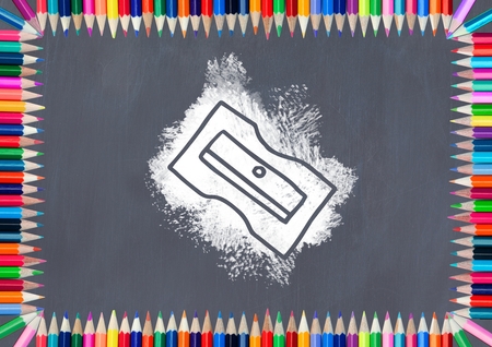 Digital composite of sharpener on blackboardの写真素材