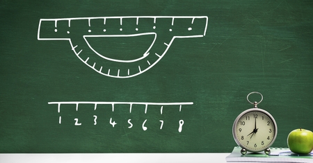 Digital composite of Clock on Desk foreground with blackboard graphics of measurement rulersの写真素材