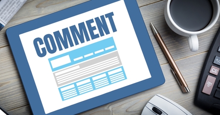 Digital composite of Comment text and graphic on tablet screenの写真素材