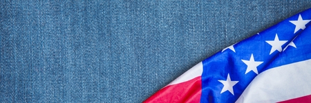 Digital composite of USA flag on demin fabricの写真素材