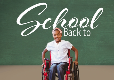 Digital composite of Back to school text on blackboard with disabled girl in wheelchairの写真素材