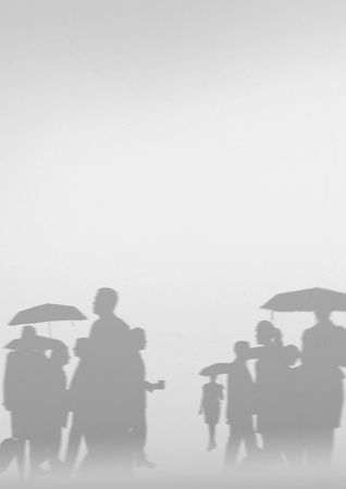 Digital composite of Business people silhouettes against white wallの写真素材