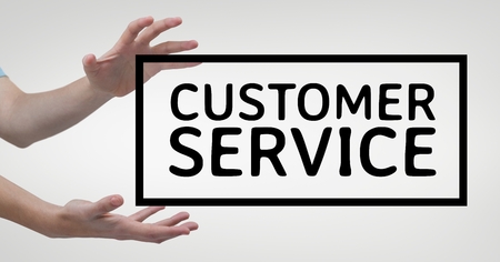 Digital composite of Hands interacting with customer service business text against white backgroundの写真素材