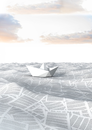 Digital composite of sea of documents under sky clouds with paper boatの写真素材