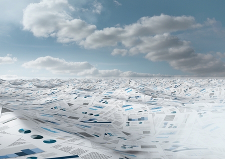 Digital composite of sea of documents under sky cloudsの写真素材