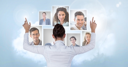 Digital composite of Businesswoman interacting and choosing a person from group of people interface