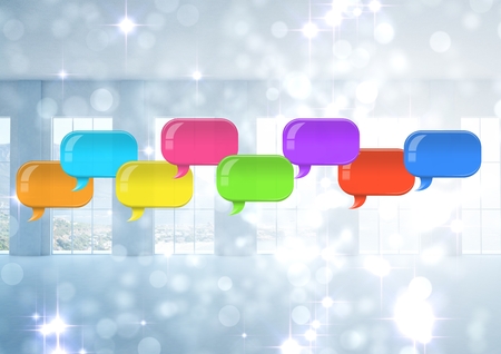 Digital composite of Group of Shiny chat bubbles floating in room
