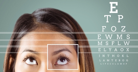 Digital composite of Woman with eye focus box detail and lines and Eye test interfaceの写真素材
