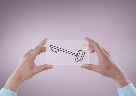 Digital composite of Business person holding a glass with keys iconsの写真素材