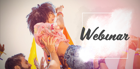 Webinar text against white background  against happy hipster woman crowd surfingの写真素材