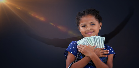 Silhouette woman stretching against portrait of smiling girl embracing currency