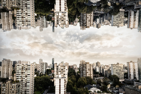 Buildings in city against blue sky