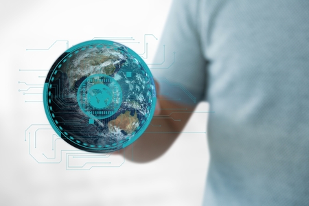 Digital composite of Business man holding a globe with connectors