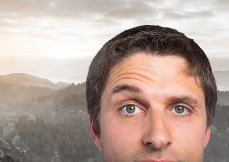 Digital composite of Businessman in nature landscapeの写真素材