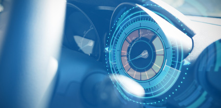 Digital image of volume knob against cropped image of car dashboard