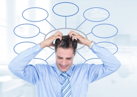 Digital composite of Businessman and mind map over bright background