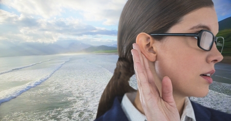 Digital composite of Woman listening to natureの写真素材