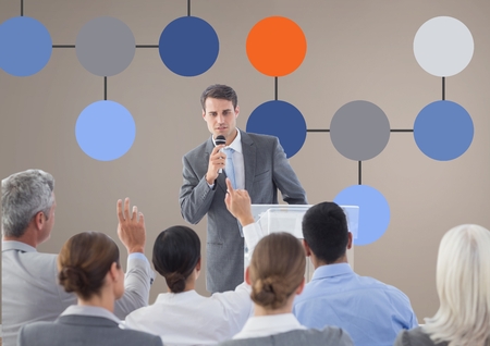 Digital composite of Group meeting and Colorful mind map over wall backgroundの写真素材
