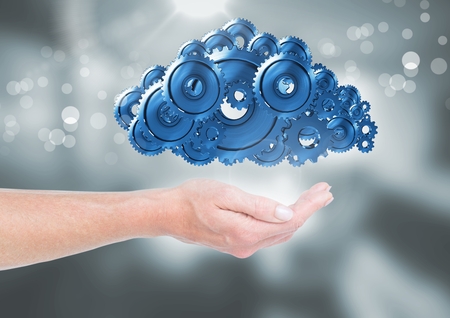 Digital composite of Open hand with cog gears cloudの写真素材