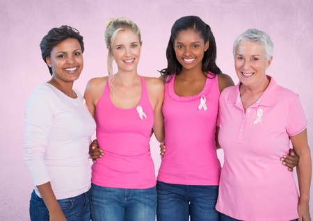 Digital composite of pink breast cancer awareness womenの写真素材
