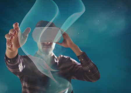 Digital composite of man using vr headset front viewの写真素材