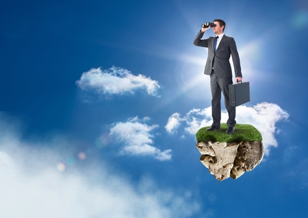 Digital composite of Businessman with binoculars on floating rock platform in skyの写真素材