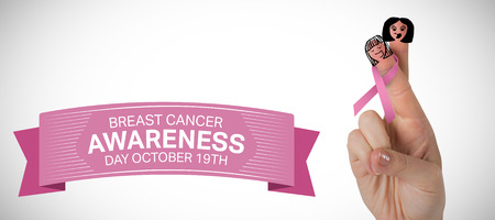 Cropped image of hand with pink breast cancer awareness ribbon against white background with vignetteの写真素材