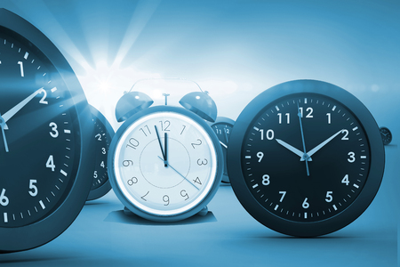 Digital composite image of clocks against white background