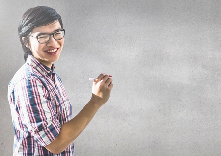 Digital composite of Creative man with grey backgroundの写真素材