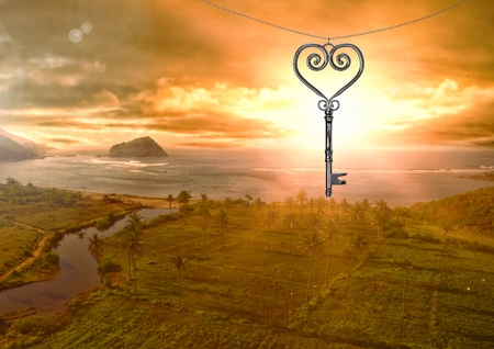 Digital composite of 3D Heart Key floating over landscape and sunsetの写真素材