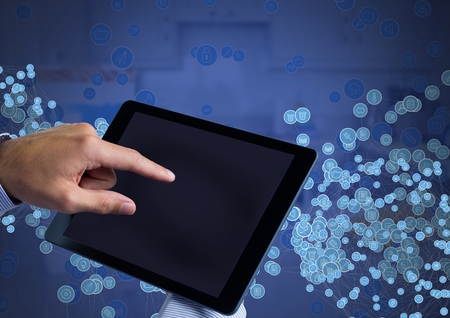 Digital composite of Hand holding tablet  with connectors