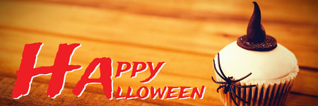 Graphic image of Happy Halloween text against cup cake with spider and witch hat on tableの写真素材