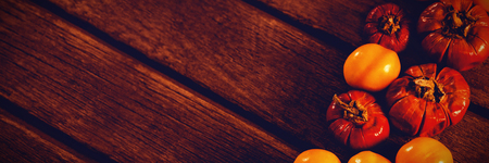 Close up of candies with small pumpkins arranged on tableの写真素材