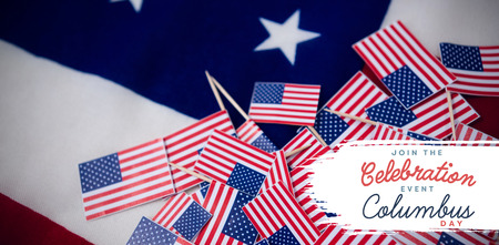 Title for columbus day event  against full frame shot of flagsの写真素材