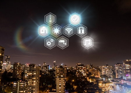 Digital composite of Icons interface of Internet Of Things over city backgroundの写真素材