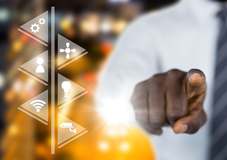 Digital composite of Hand touching icons interface of internet of thingsの写真素材