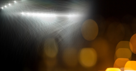 Digital composite of Sports stadium lights transition effect with sparkles
