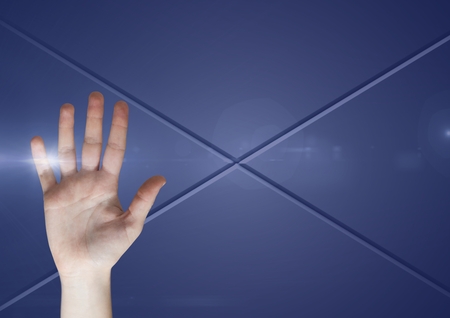Digital composite of Hand touching the air with glowの写真素材