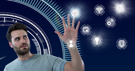 Digital composite of Hand touching icons interface of internet of things