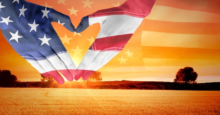 Digital composite of Veterans day, flag usa on handsの写真素材