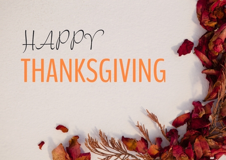 Digital composite of Happy thanksgiving text with dried Autumn flowersの写真素材