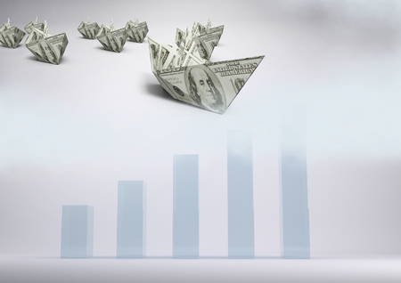 Digital composite of Paper dollar money boats with bar chartsの写真素材