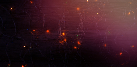 Rice lights illuminated on wooden plank during Christmas time