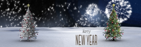 Digital composite of Happy new year text and Christmas trees in winter landscape with fireworks