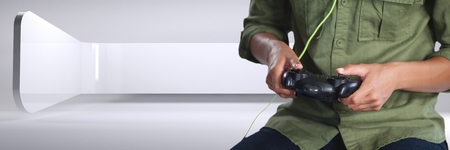 Digital composite of Person playing with computer game controller with bright white background
