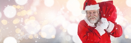 Digital composite of Santa with sackの写真素材