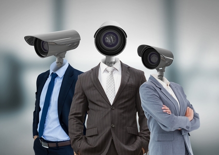Digital composite of Businessman with CCTV head at officeの写真素材