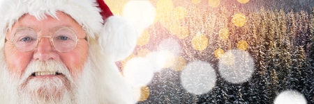 Digital composite of Santa with Winter landscapeの写真素材