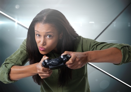 Digital composite of woman playing with computer game controller