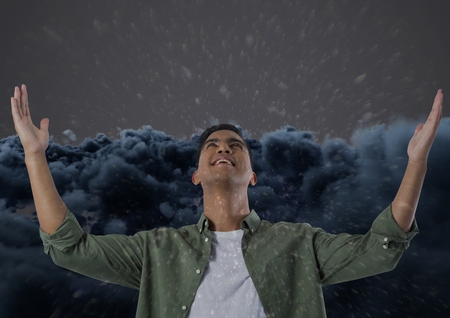 Digital composite of Frustrated man in front clouds